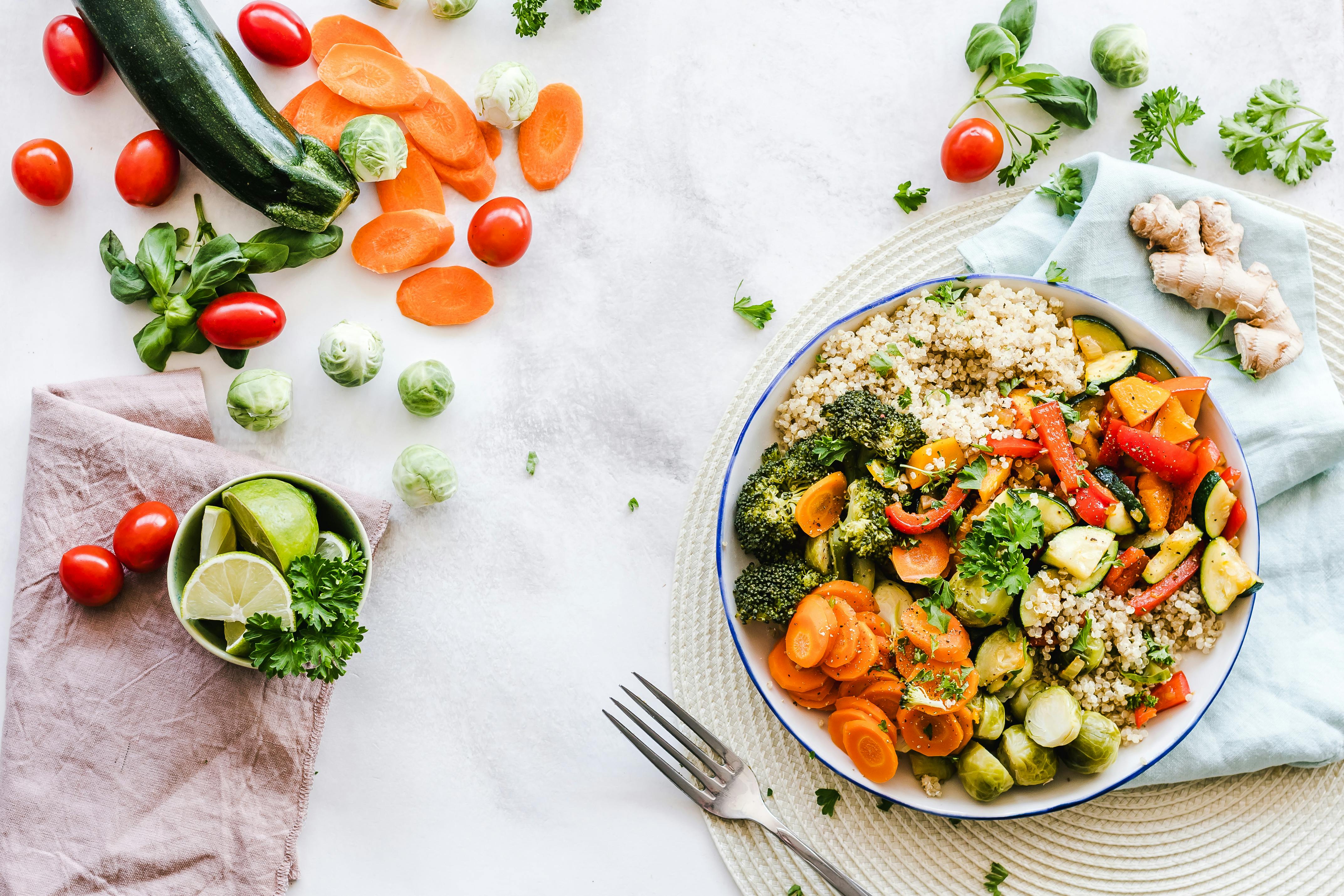 Fresh vegetables in a dish on a table.